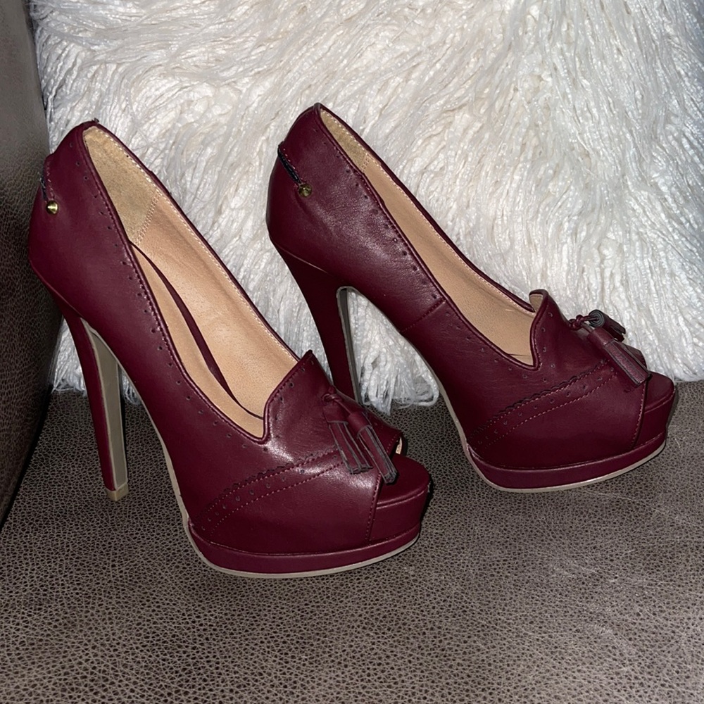 Never worn ….. 6 inch stiletto….wine color